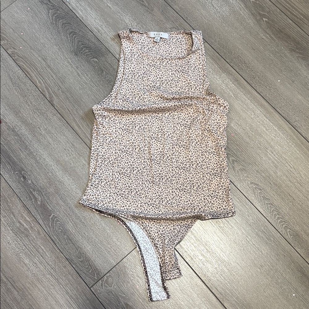 MM217 Gaze animal print body suit